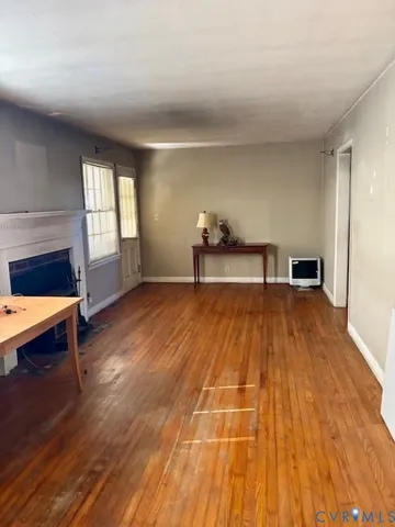 a kitchen with granite countertop cabinets a sink and a stove