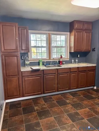 a bathroom with a sink and a shower