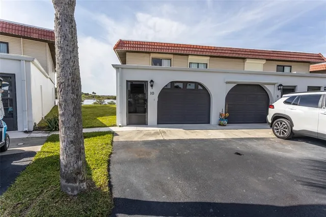 a view of building with parking space