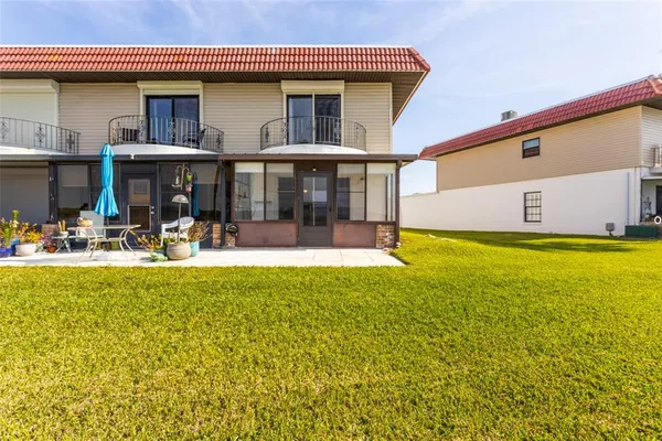 a view of a house with swimming pool