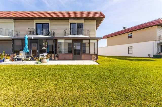 a view of a house with swimming pool