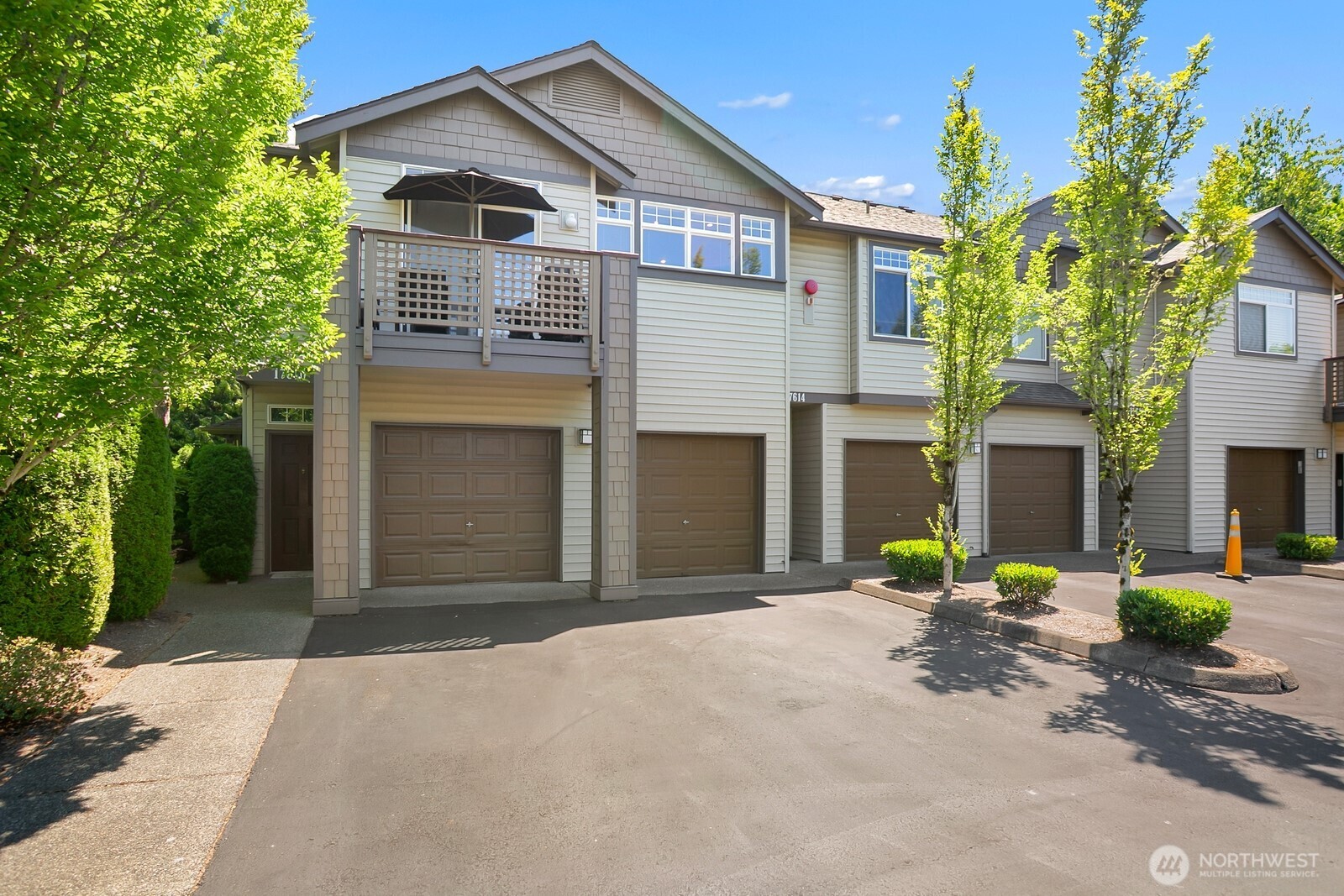 17614 134th Lane Southeast Renton, WA 98058 - Photo 15 of 16 a front view of a house with a yard and garage