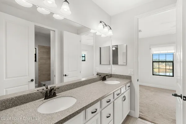 a bathroom with a toilet and window