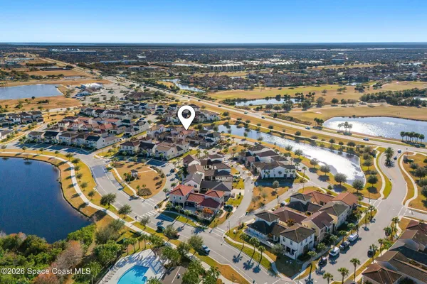 a view of a swimming pool with an ocean view