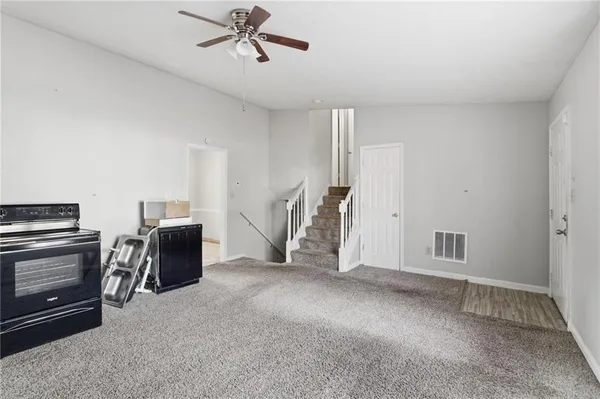 a view of a livingroom with a furniture