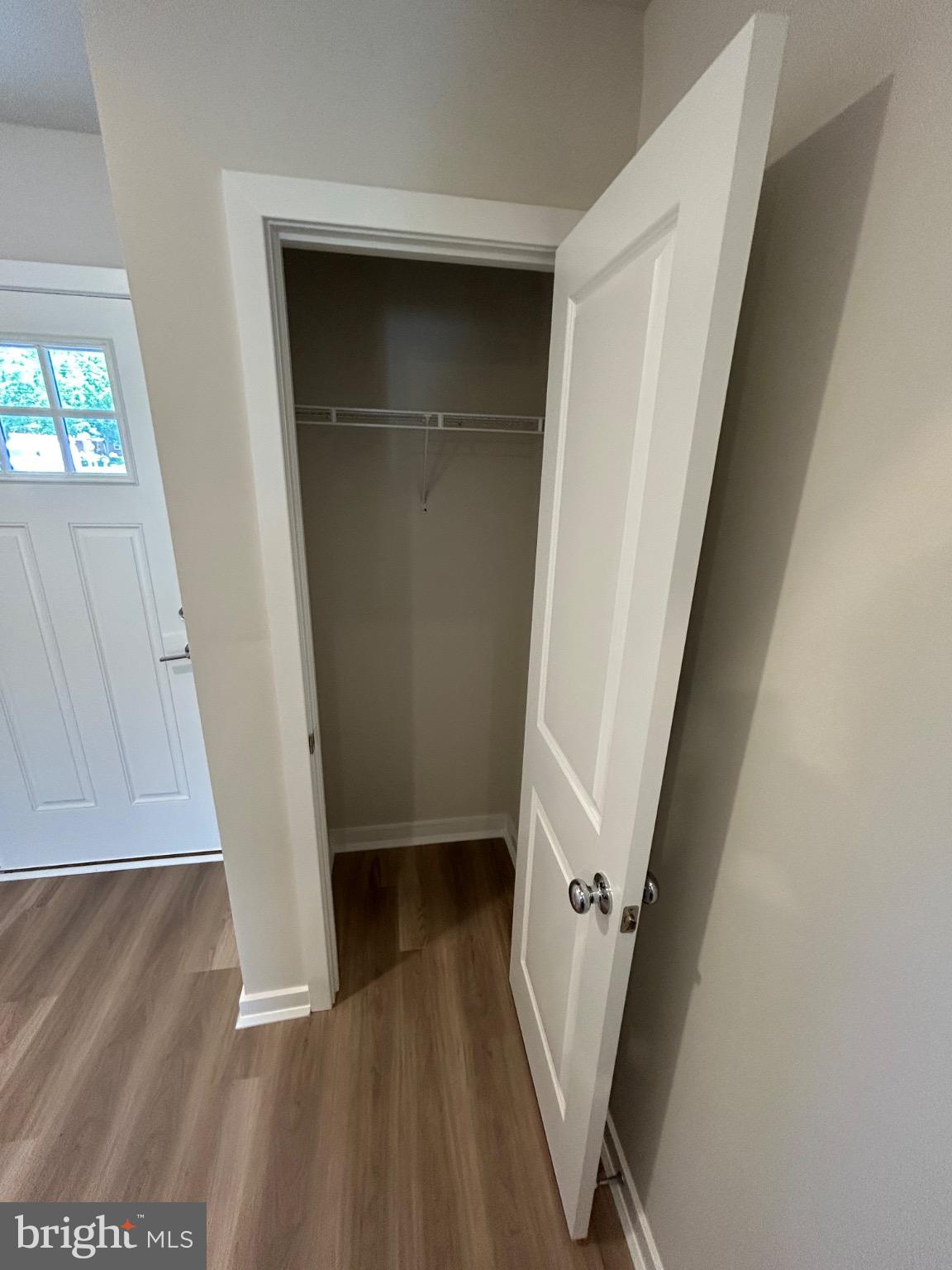 74 Morgans Ml Road Sicklerville, NJ 08081 - Photo 11 of 39 an entryway door with lots of frames on wall