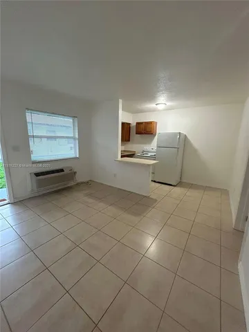 a view of workspace with wooden floor