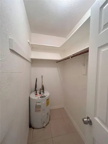 a bathroom with a toilet sink and bathtub