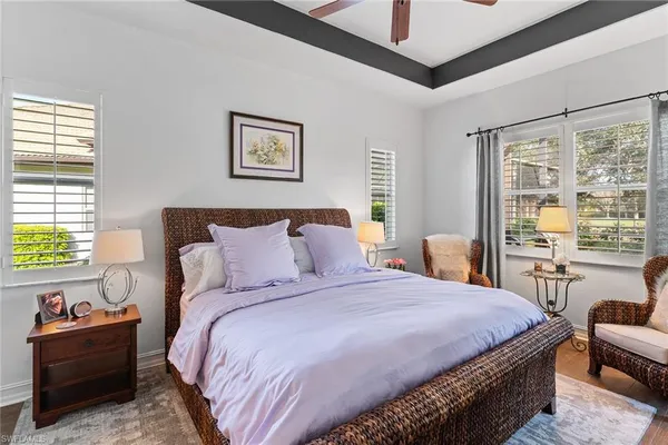 a kitchen with a refrigerator and a stove top oven