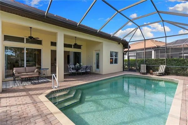 a view of yard with patio