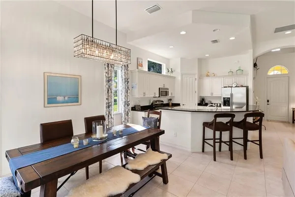 a view of a dining room with furniture
