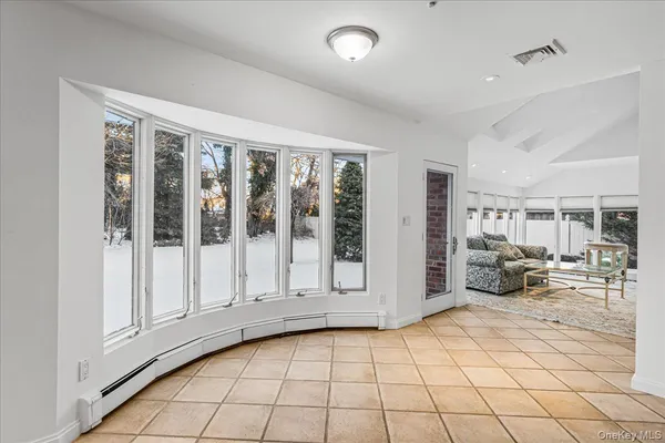 a large kitchen with stainless steel appliances lots of counter top space and cabinets