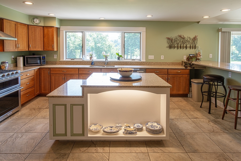136 Main Street Hatfield, MA 01038 - Photo 11 of 42 a kitchen with a sink cabinets and window