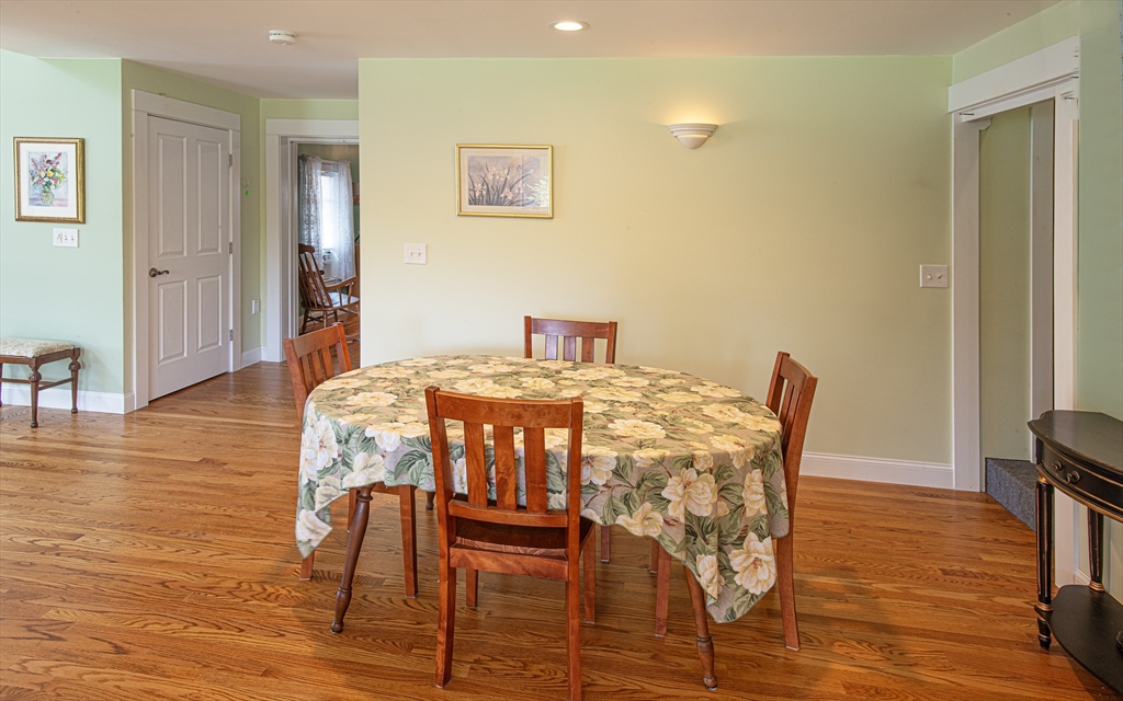 136 Main Street Hatfield, MA 01038 - Photo 14 of 42 a view of a dining room with furniture and wooden floor