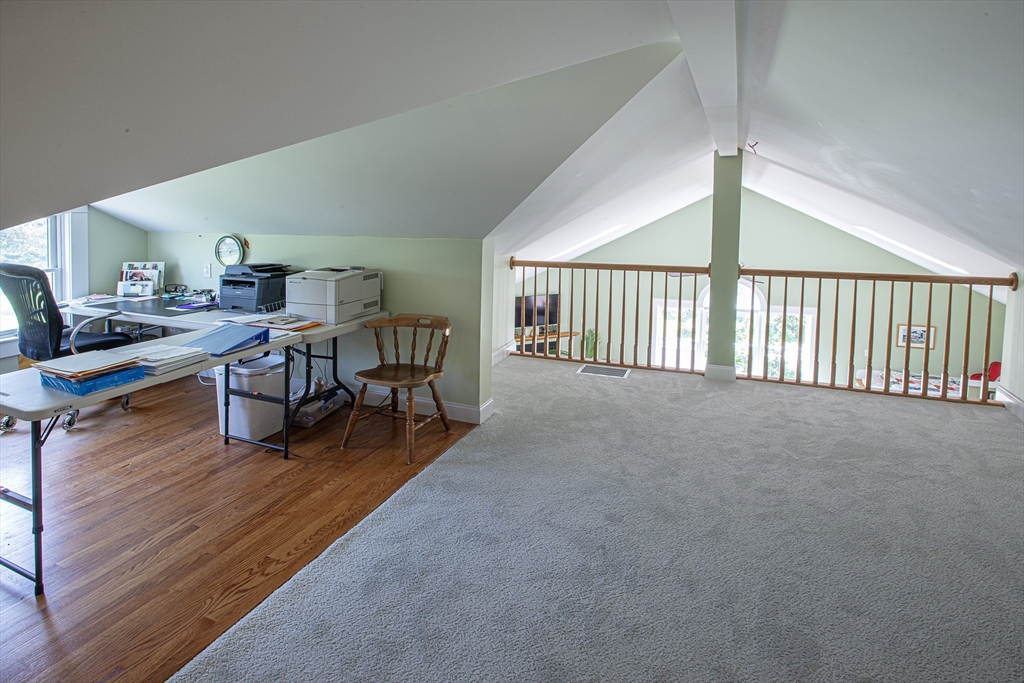 136 Main Street Hatfield, MA 01038 - Photo 15 of 42 a view of a livingroom with furniture and wooden floor