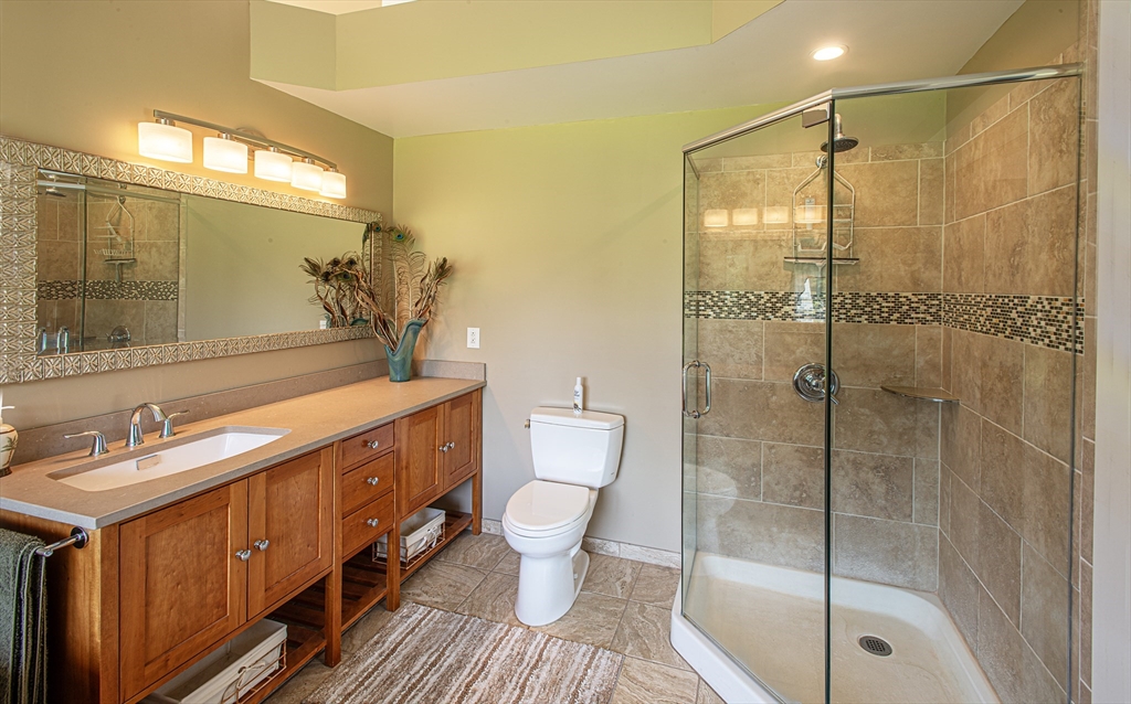 136 Main Street Hatfield, MA 01038 - Photo 22 of 42 a bathroom with a shower sink vanity mirror and toilet