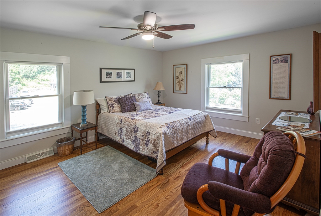 136 Main Street Hatfield, MA 01038 - Photo 23 of 42 a bedroom with a bed and a couch