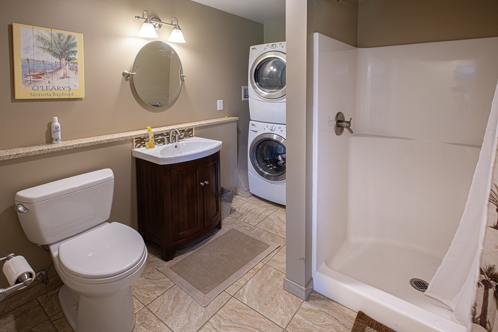 136 Main Street Hatfield, MA 01038 - Photo 25 of 42 a bathroom with a toilet a sink and mirror