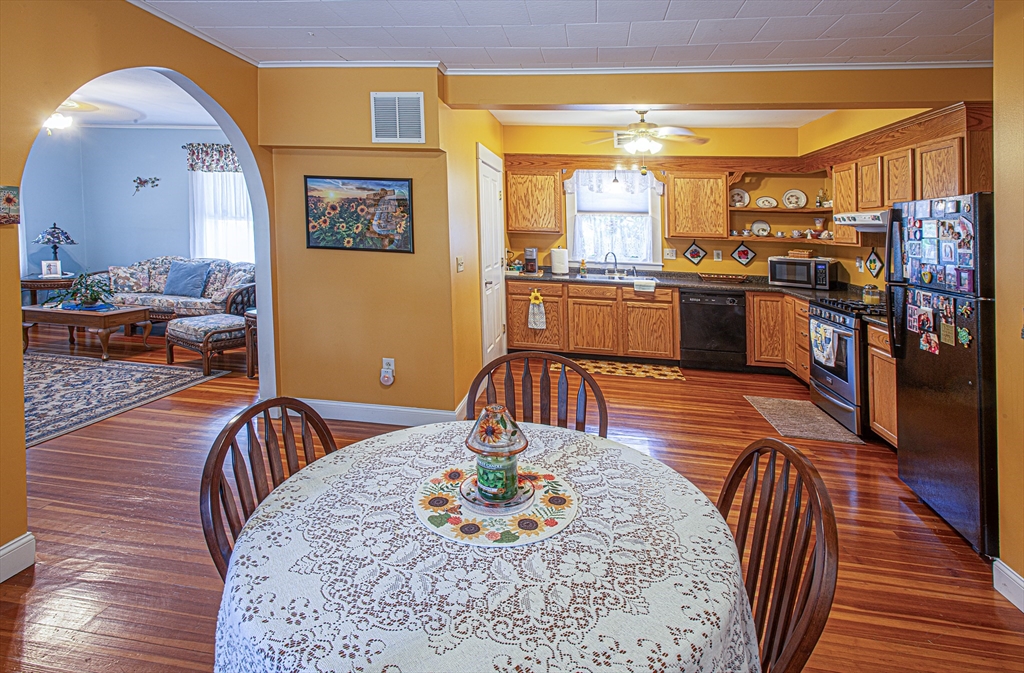 136 Main Street Hatfield, MA 01038 - Photo 32 of 42 a living room with dining room and wooden floor