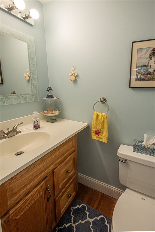 136 Main Street Hatfield, MA 01038 - Photo 37 of 42 a bathroom with a sink mirror vanity and toilet