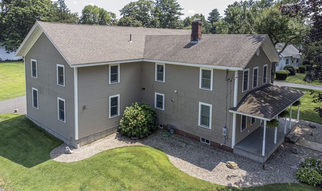 136 Main Street Hatfield, MA 01038 - Photo 5 of 42 a aerial view of a house with yard and sitting area