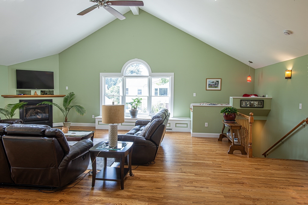 136 Main Street Hatfield, MA 01038 - Photo 8 of 42 a living room with furniture and a flat screen tv