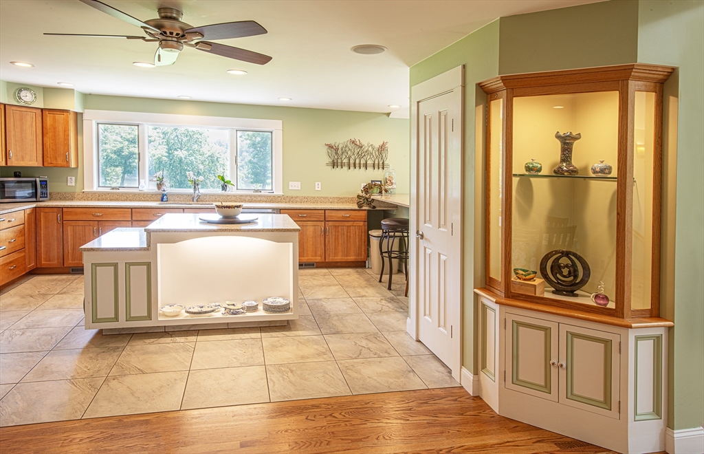 136 Main Street Hatfield, MA 01038 - Photo 10 of 42 a room with a large window and a rug