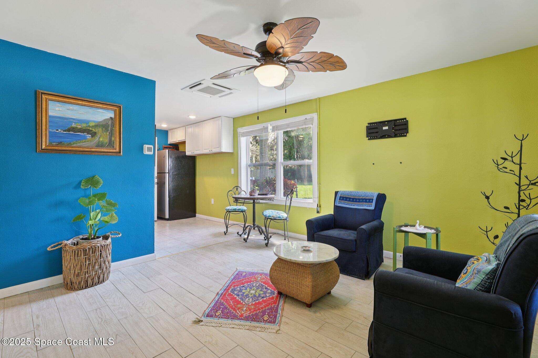 72 Rockledge Avenue Rockledge, FL 32955 - Photo 3 of 28 a living room with furniture and a large window