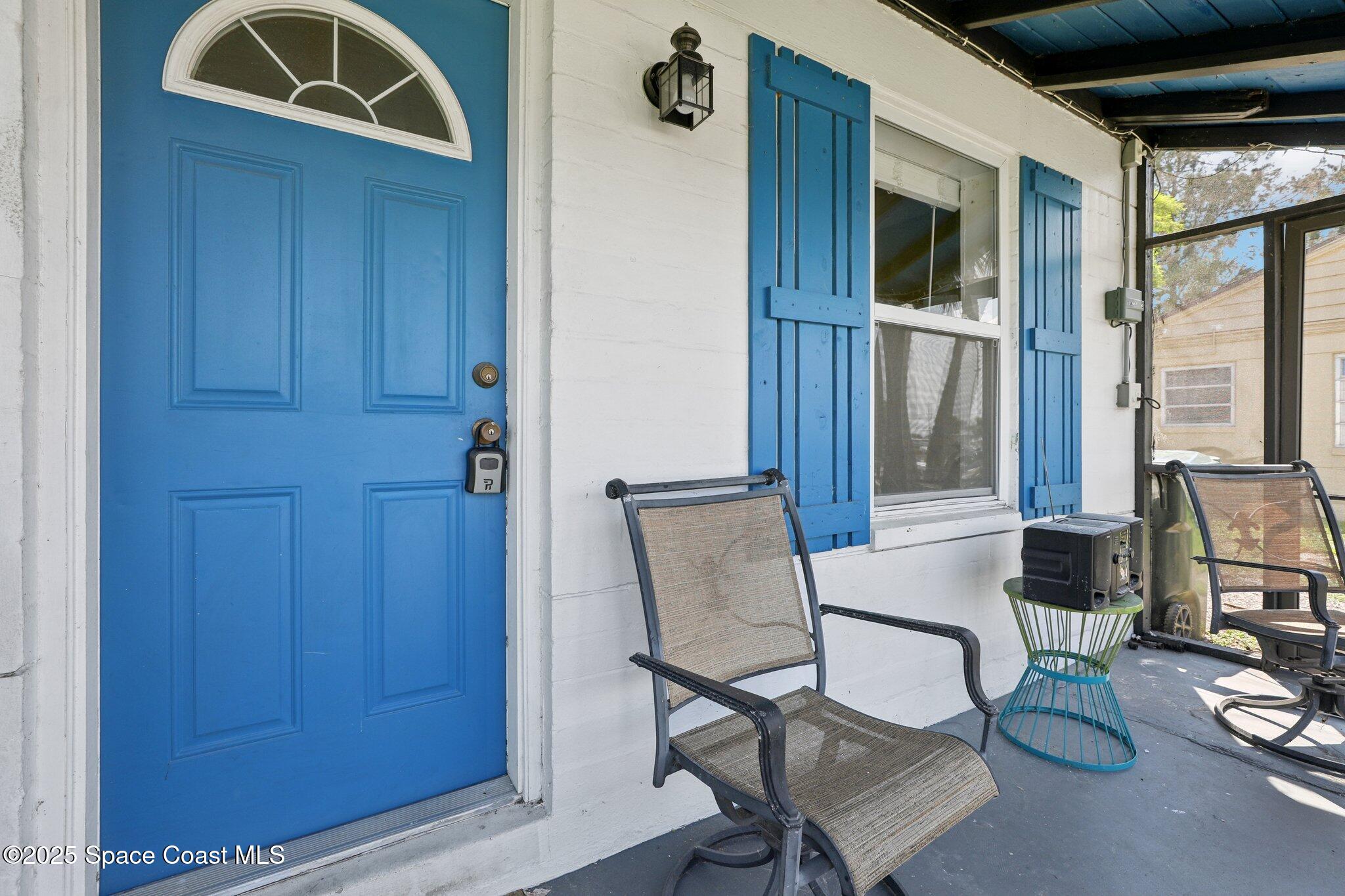 72 Rockledge Avenue Rockledge, FL 32955 - Photo 8 of 28 a view of kitchen with furniture and wooden floor