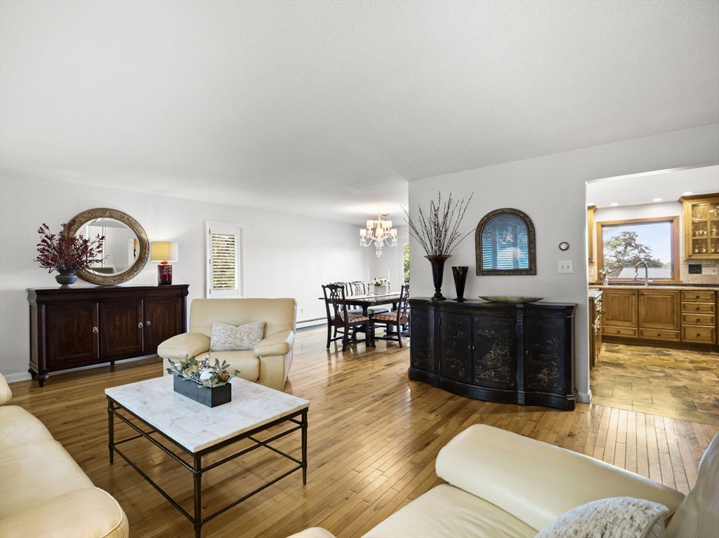 15 North Street Andover, MA 01810 - Photo 12 of 42 a living room with furniture a rug and a window