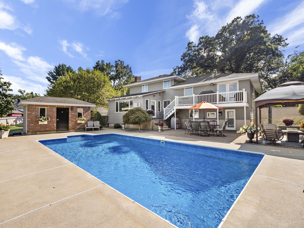 15 North Street Andover, MA 01810 - Photo 39 of 42 a view of a house with swimming pool and sitting area