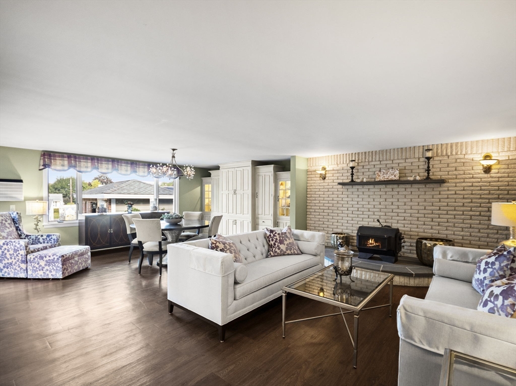 15 North Street Andover, MA 01810 - Photo 5 of 42 a living room with furniture wooden floor and a fireplace
