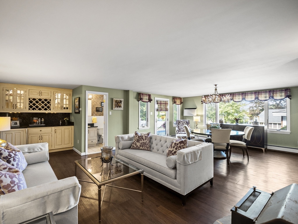 15 North Street Andover, MA 01810 - Photo 6 of 42 a living room with furniture and a large window