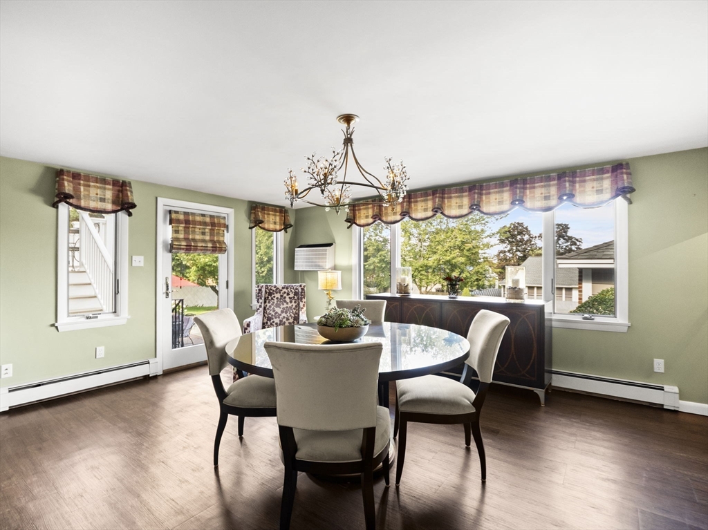 15 North Street Andover, MA 01810 - Photo 7 of 42 a dining room with furniture and wooden floor