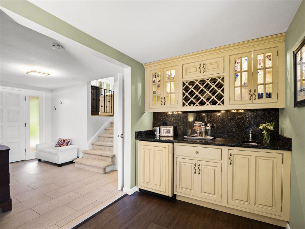 15 North Street Andover, MA 01810 - Photo 10 of 42 a kitchen with stainless steel appliances a sink and cabinets
