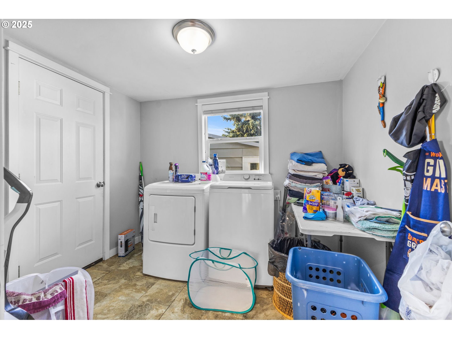 221 Southwest Rainbow Avenue Dallas, OR 97338 - Photo 14 of 36 a storage room with washer and dryer