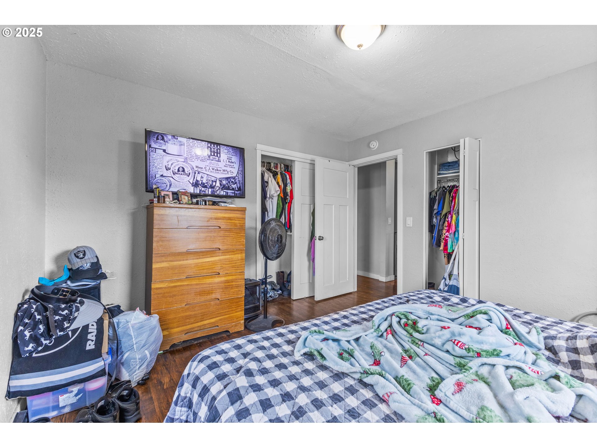 221 Southwest Rainbow Avenue Dallas, OR 97338 - Photo 17 of 36 a bedroom with a bed and a closet