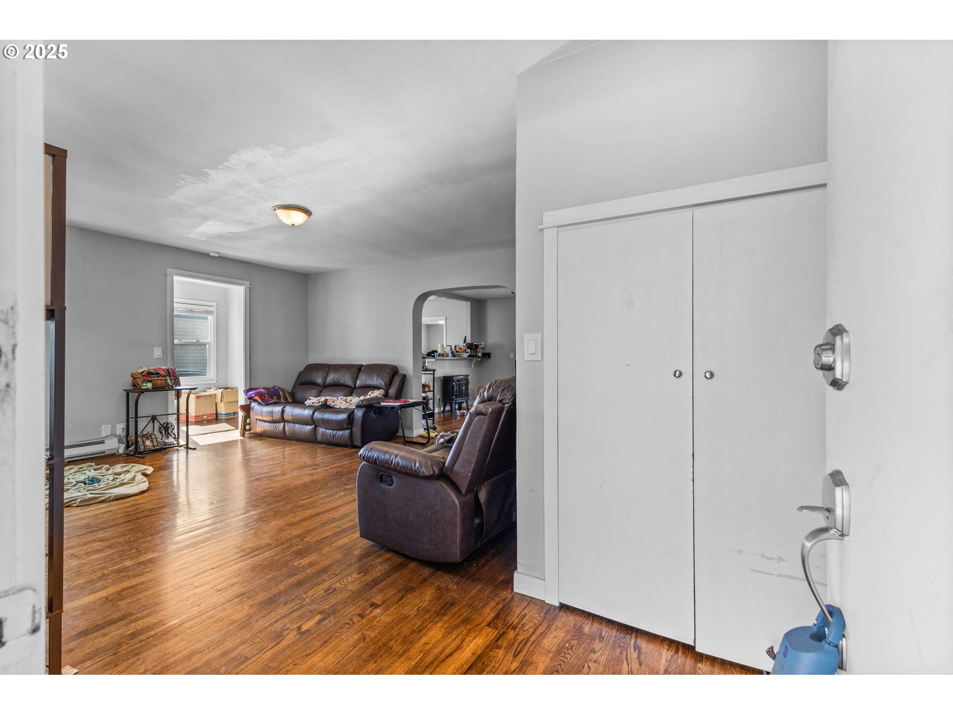 221 Southwest Rainbow Avenue Dallas, OR 97338 - Photo 5 of 36 a living room with furniture and a wooden floor
