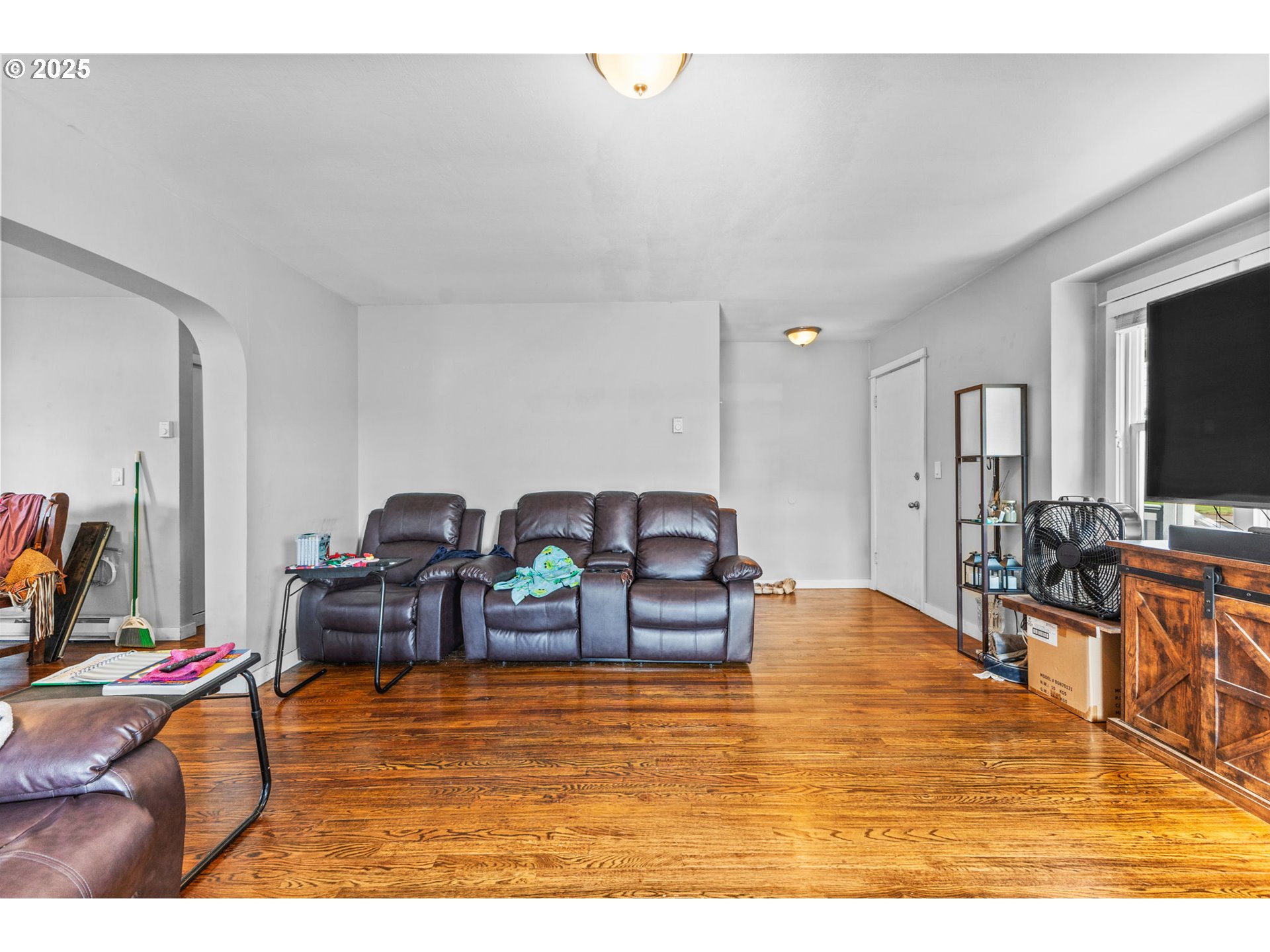 221 Southwest Rainbow Avenue Dallas, OR 97338 - Photo 7 of 36 a living room with furniture and flat screen tv