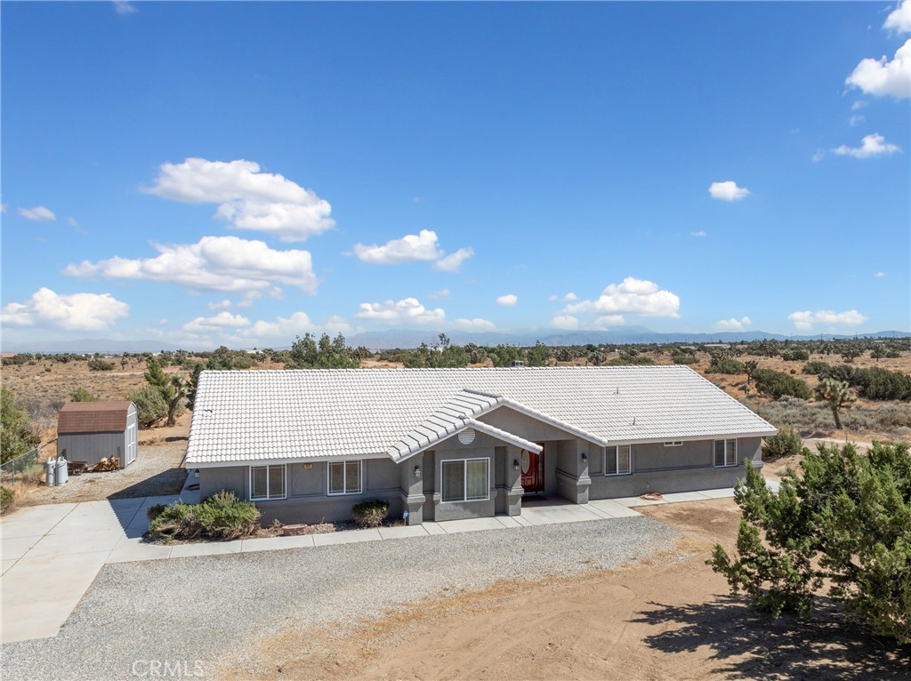 10121 Rochester Road Phelan, CA 92371 - Photo 1 of 1 a view of a terrace with a lake view