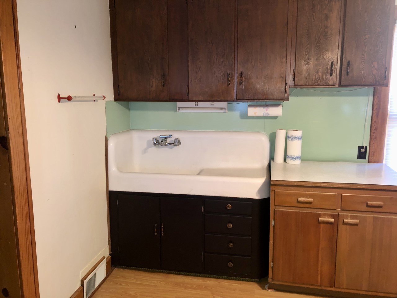 404 West Erie Street Spring Valley, IL 61362 - Photo 5 of 11 a kitchen with a sink and cabinets
