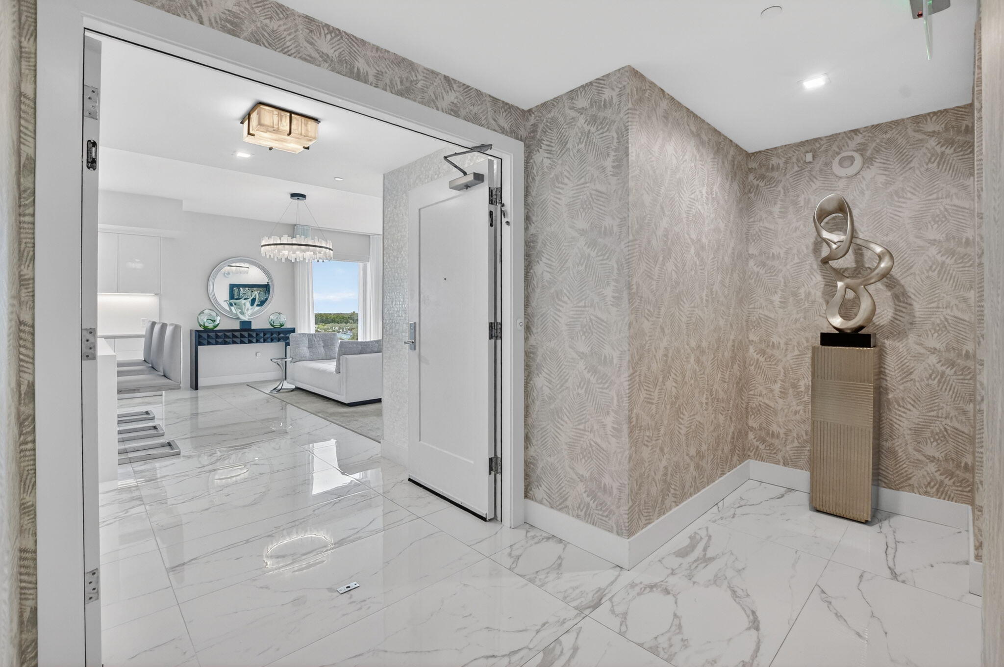 20155 Boca W Drive, Unit B701 Boca Raton, FL 33434 - Photo 7 of 78 a view of a hallway with seating area