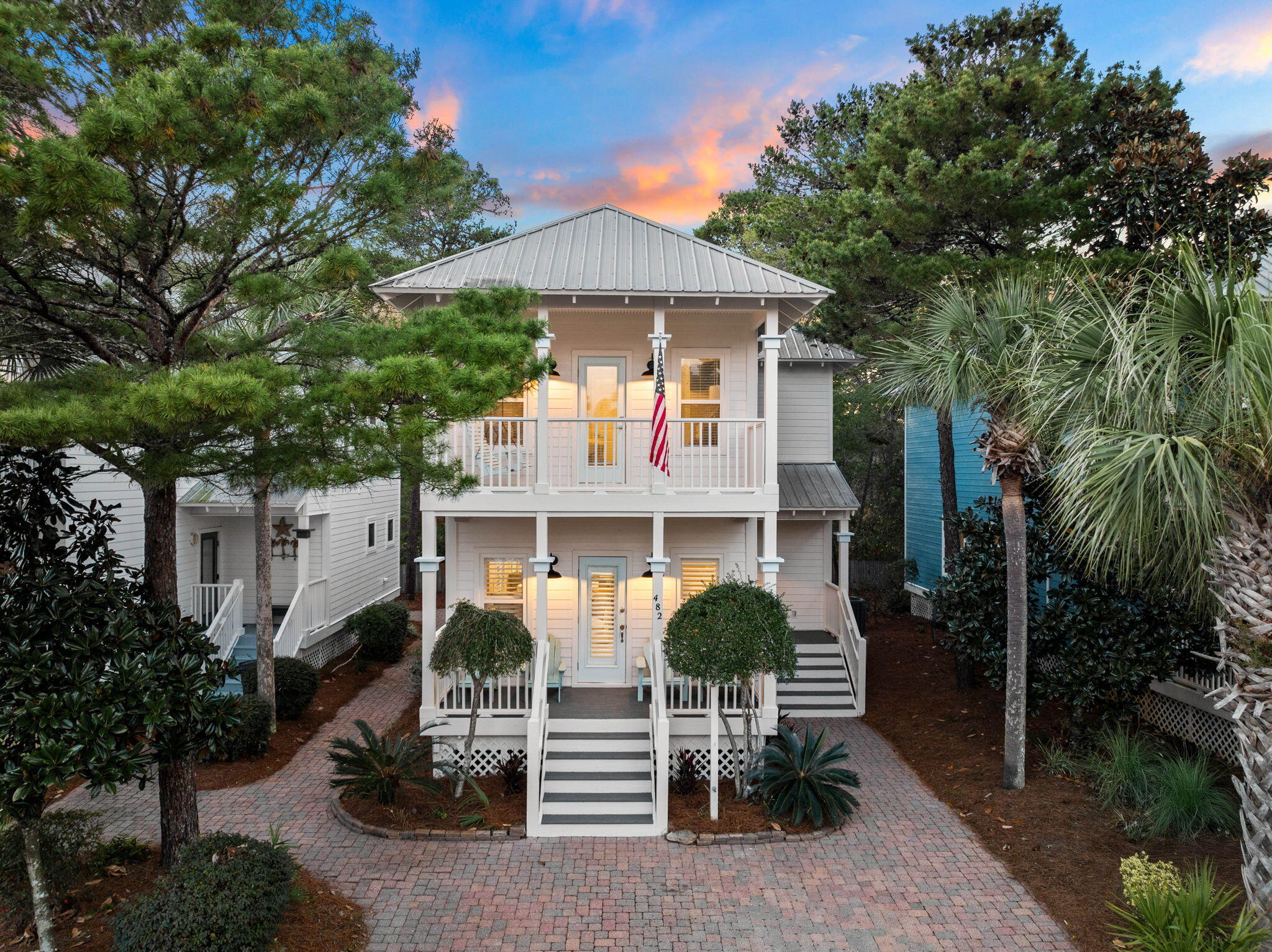 482 Hidden Lake Way Santa Rosa Beach, FL 32459 - Photo 1 of 51 a front view of a house with a porch