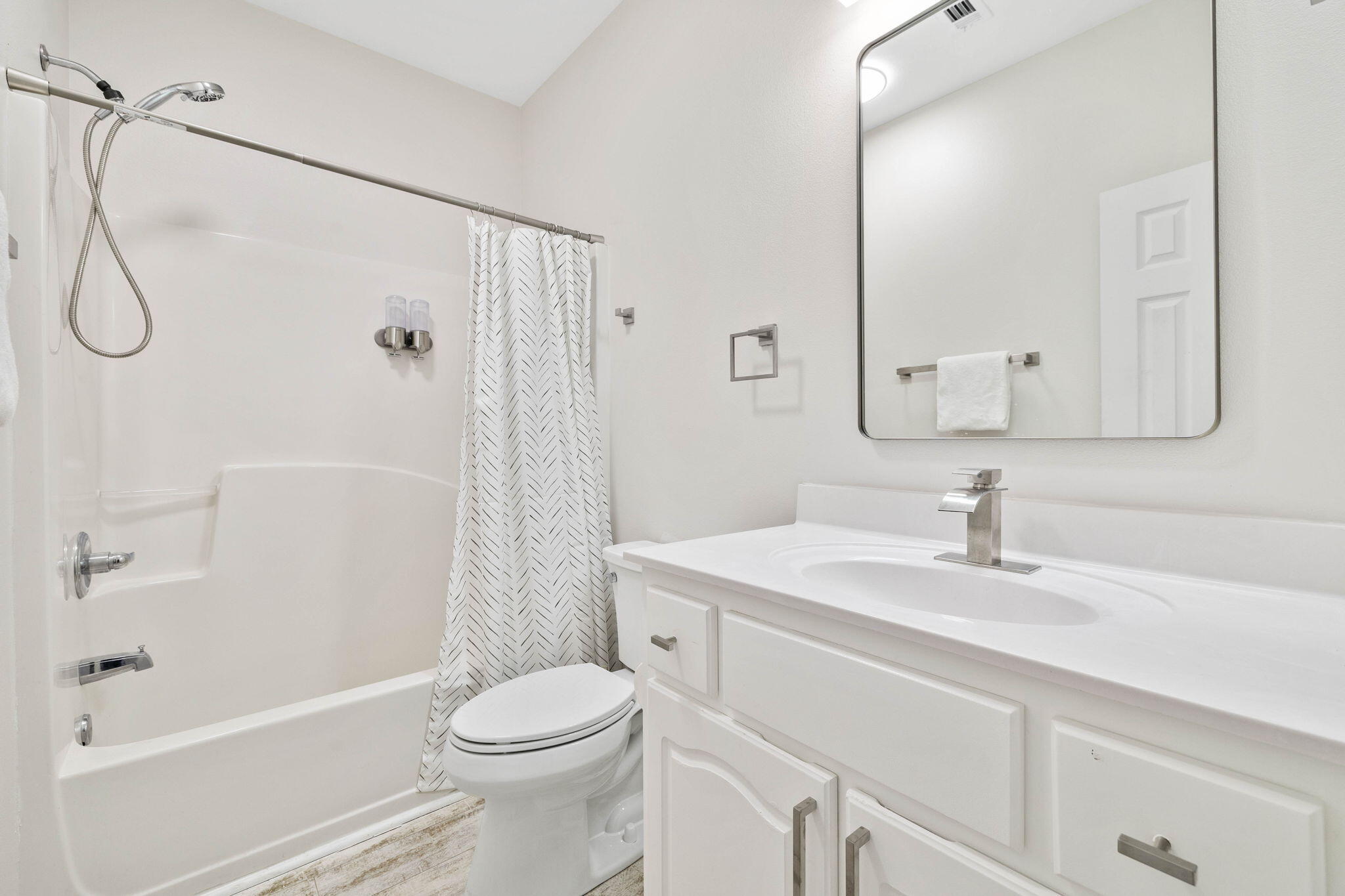 482 Hidden Lake Way Santa Rosa Beach, FL 32459 - Photo 21 of 51 a bathroom with a sink toilet and shower