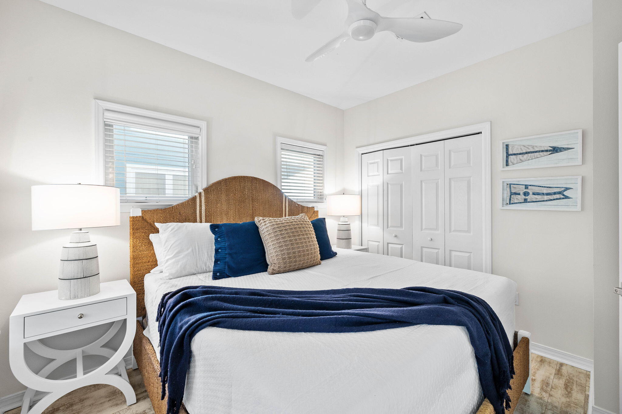 482 Hidden Lake Way Santa Rosa Beach, FL 32459 - Photo 22 of 51 a bedroom with a bed and wooden floor