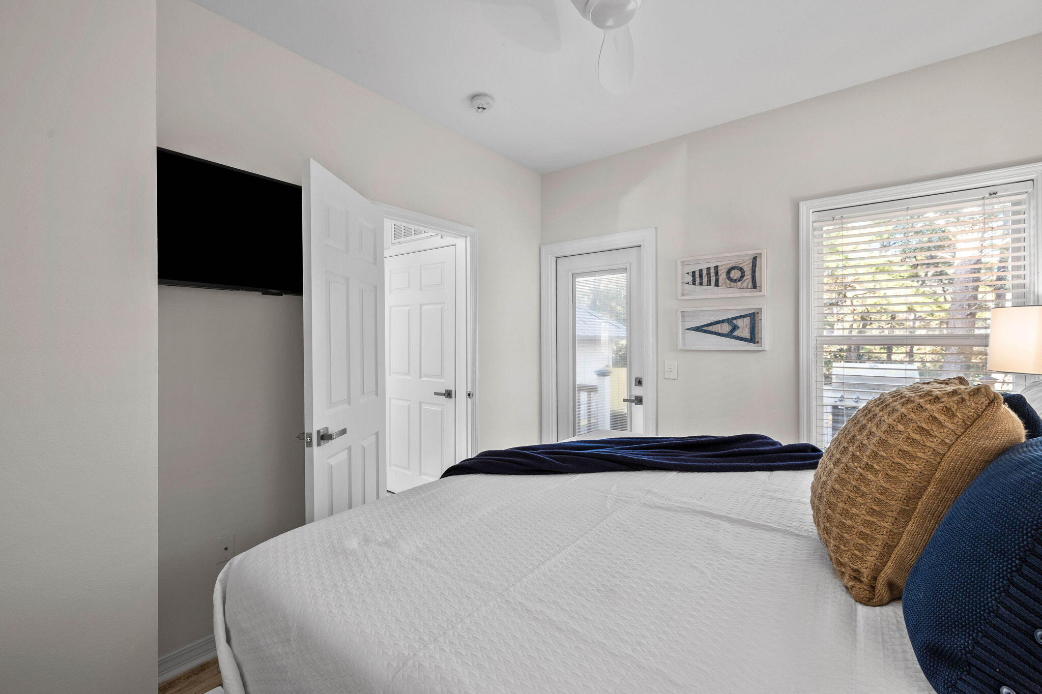 482 Hidden Lake Way Santa Rosa Beach, FL 32459 - Photo 23 of 51 a bedroom with a bed and a window