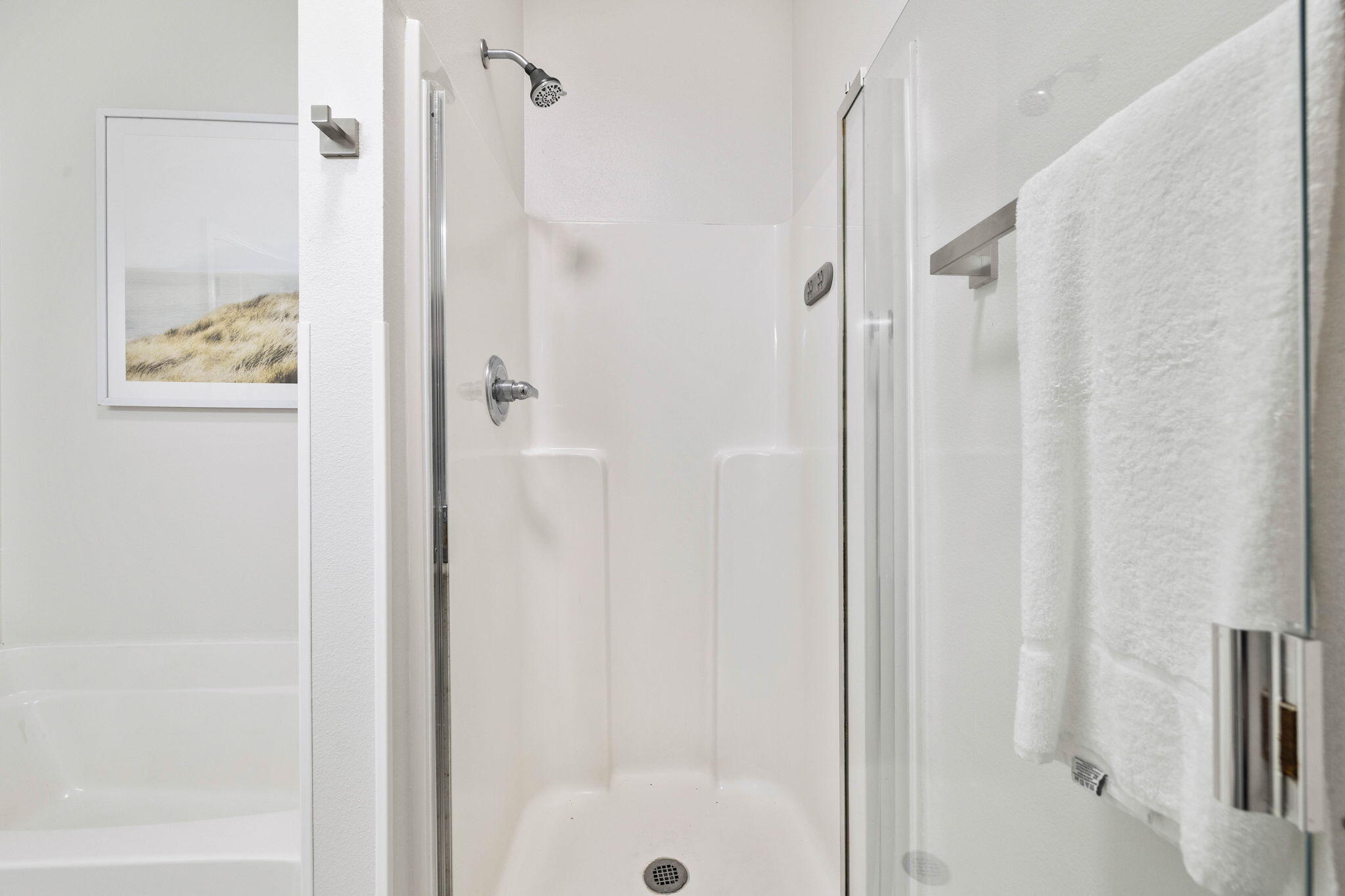 482 Hidden Lake Way Santa Rosa Beach, FL 32459 - Photo 34 of 51 a bathroom with a glass shower door and a shower