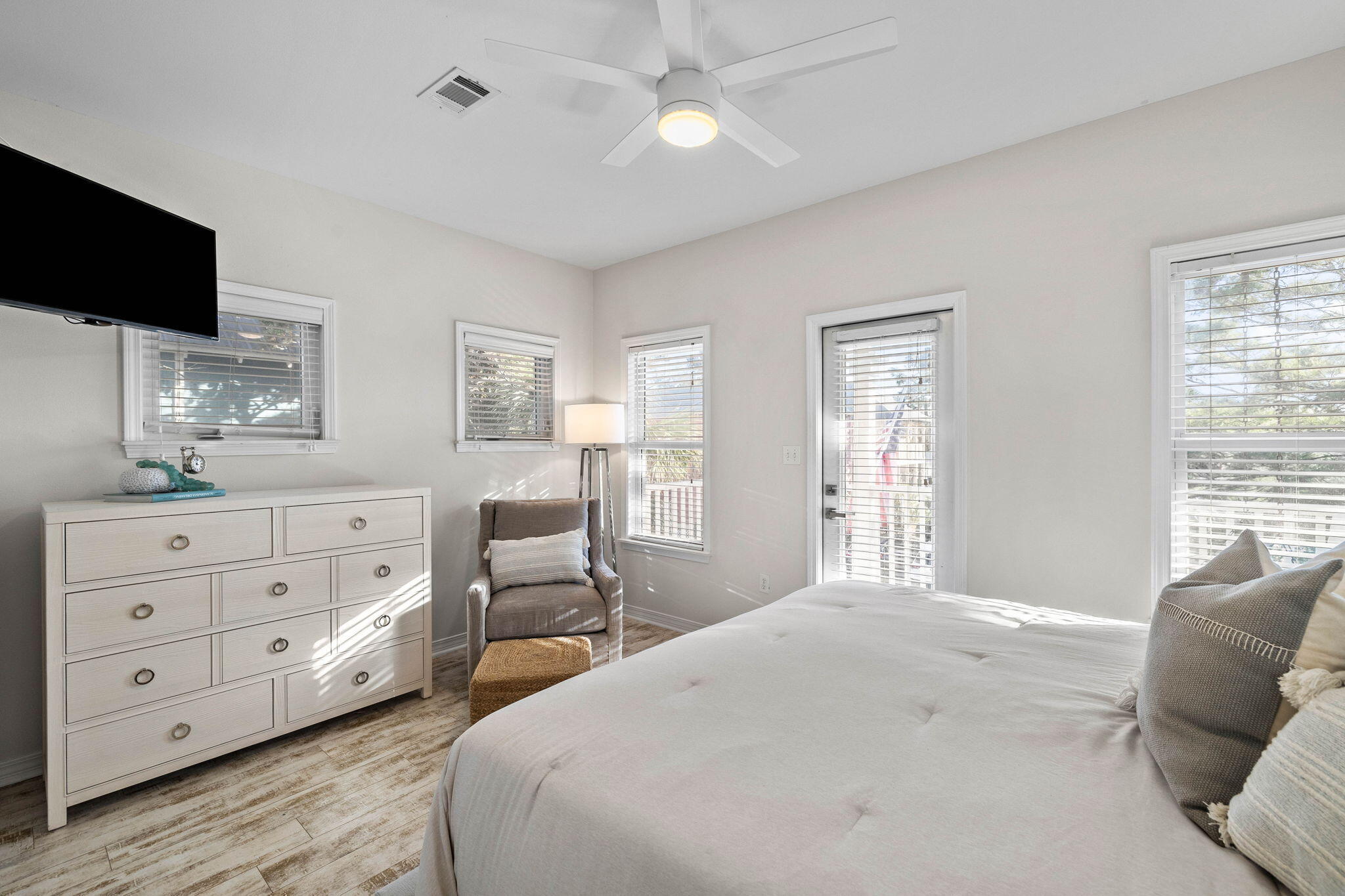482 Hidden Lake Way Santa Rosa Beach, FL 32459 - Photo 35 of 51 a bedroom with a bed and a flat screen tv