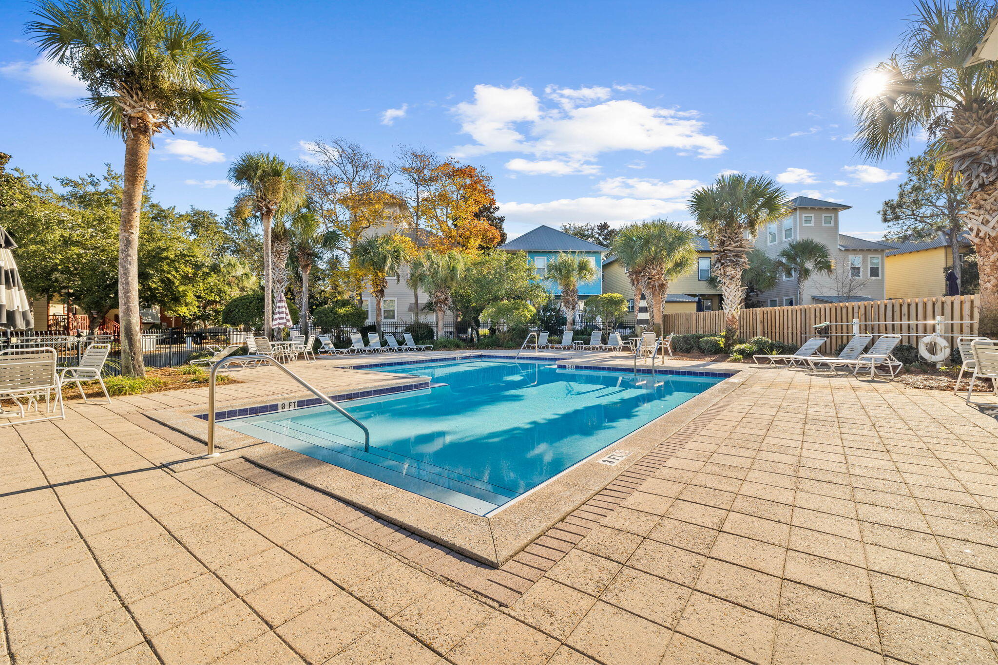 482 Hidden Lake Way Santa Rosa Beach, FL 32459 - Photo 49 of 51 a view of swimming pool with seating space and trees in the background
