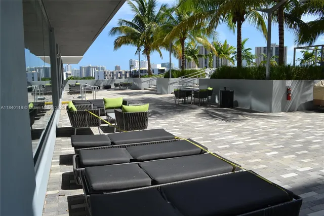 a view of outdoor space with seating area